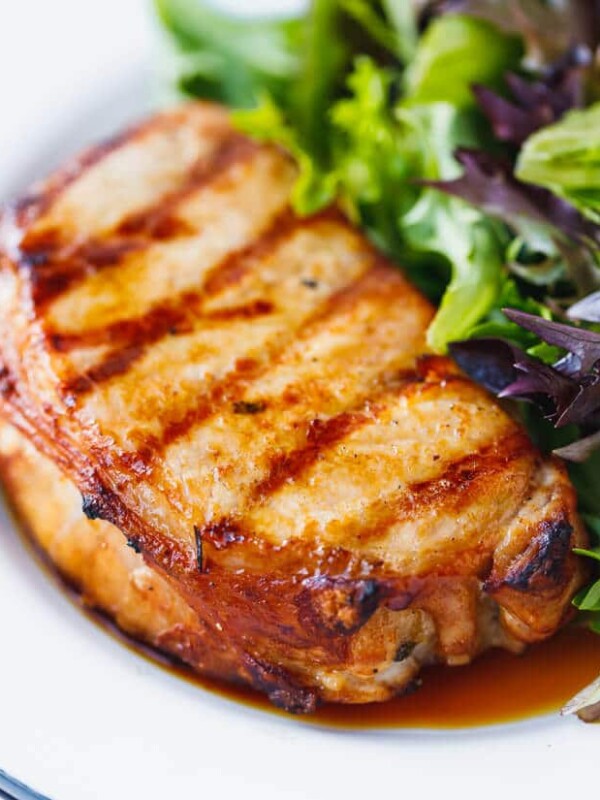 Grilled beer marinated pork chops on a plate