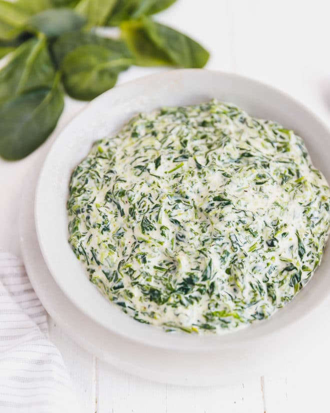 Keto creamed spinach in a gray bowl