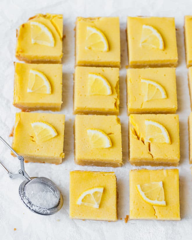 Keto lemon bars with slices of lemon on top