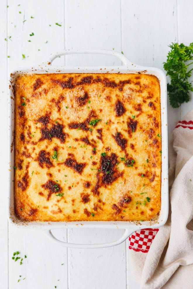 Moussaka in a square white baking dish