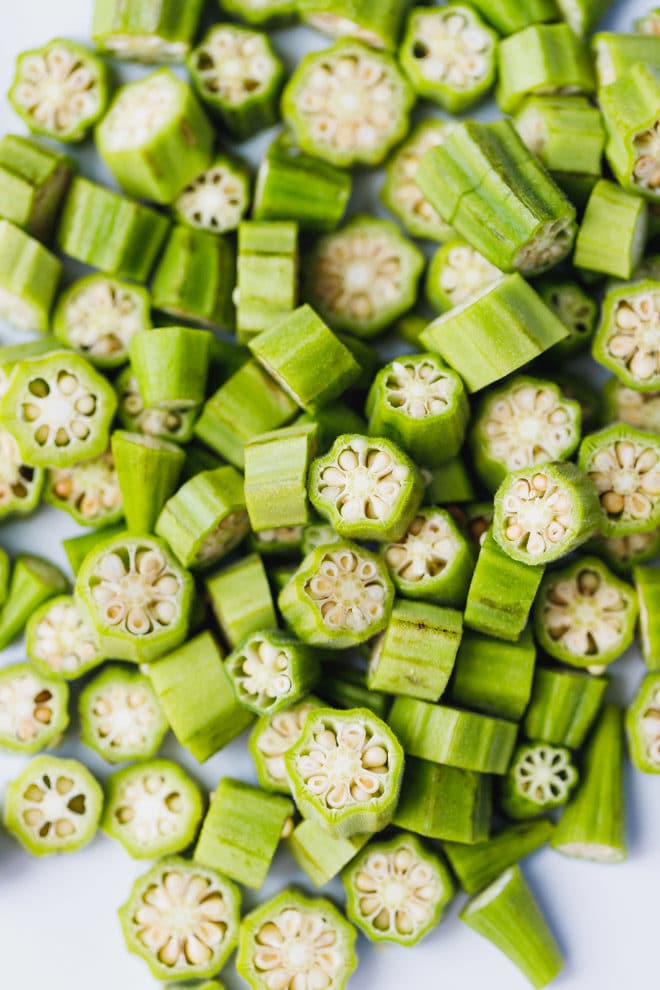 Okra pods cut into pieces to make baked okra