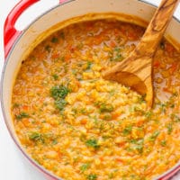 Red lentil soup in a red Dutch oven