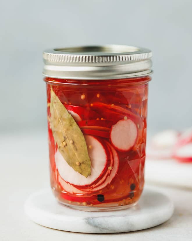 pickled radishes in a Ball jar