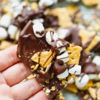 A hand holding S'mores bark