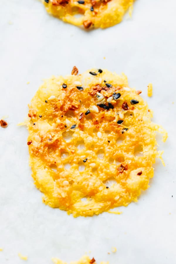 KETO CHEESE CRISPS ON PARCHMENT PAPER