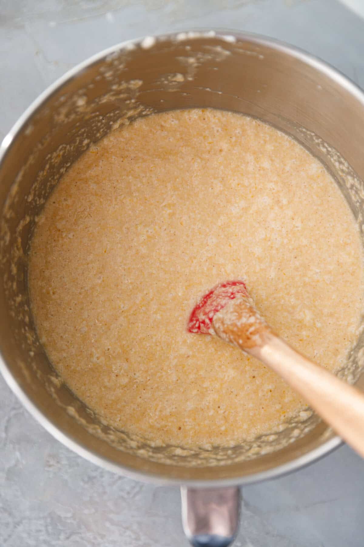 Pumpkin custard cake batter after egg whites are fully folded in, ready to pour into baking pan.
