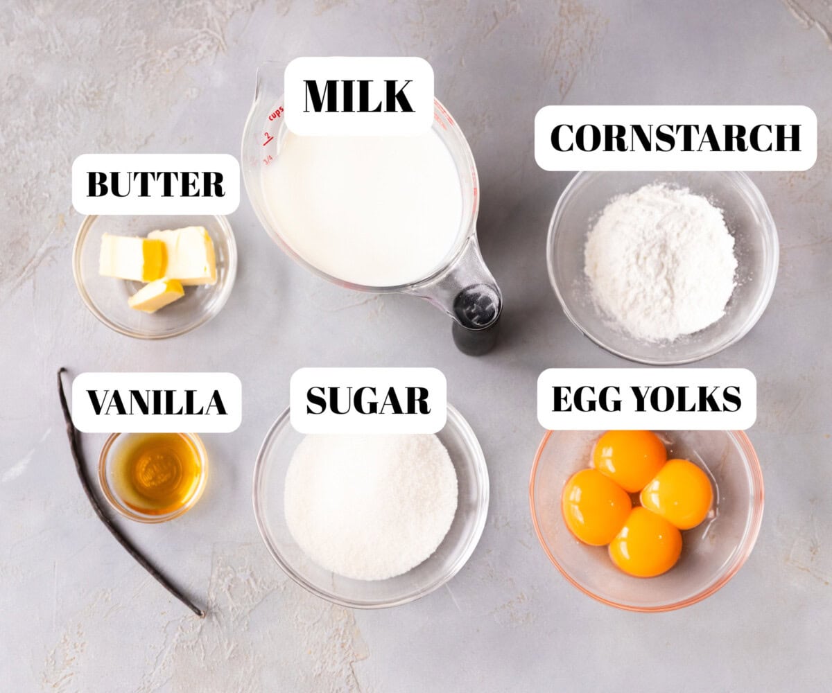 Glass bowls with ingredients for egg custard recipe