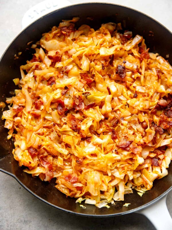 Fried cabbage with bacon in a cast iron skillet