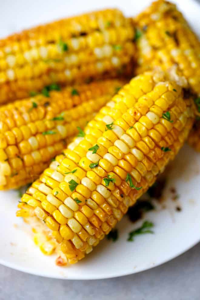 Corn on the cob on a white plate