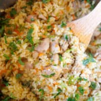 Instant pot chicken and rice with wooden spoon