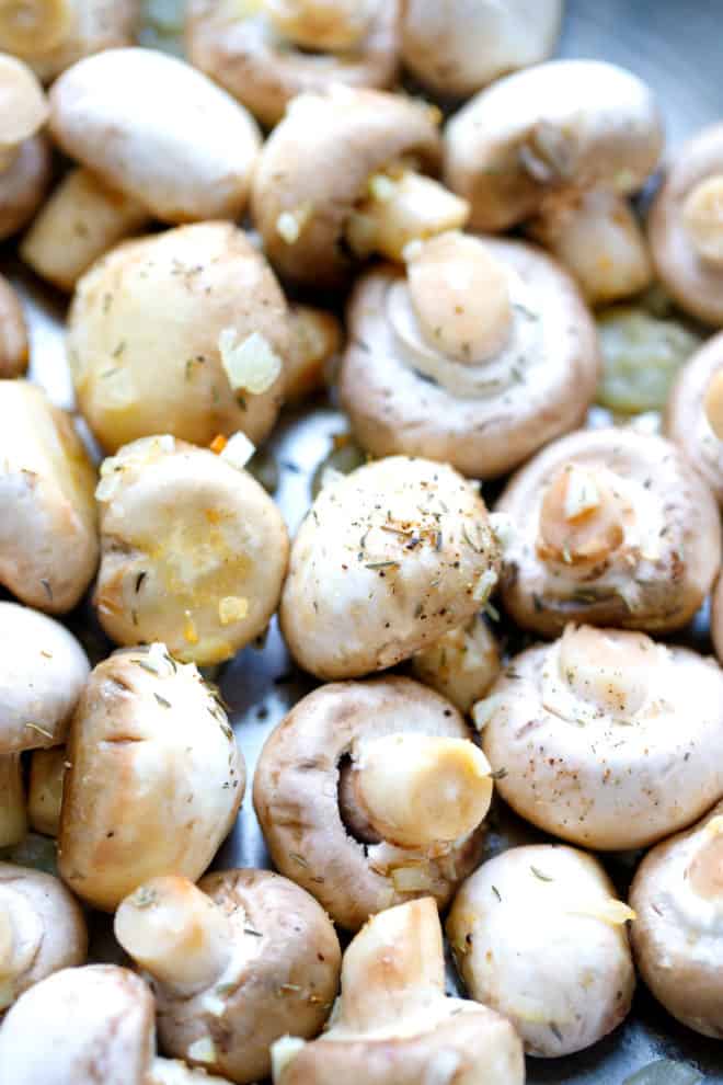 raw mushrooms in a pan