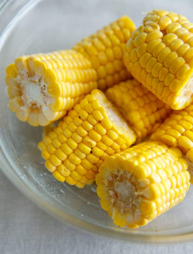 Corn pieces in a clear glass bowl