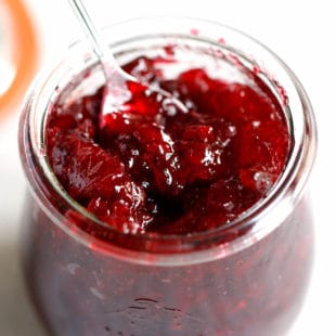 cherry jam in a glass jar