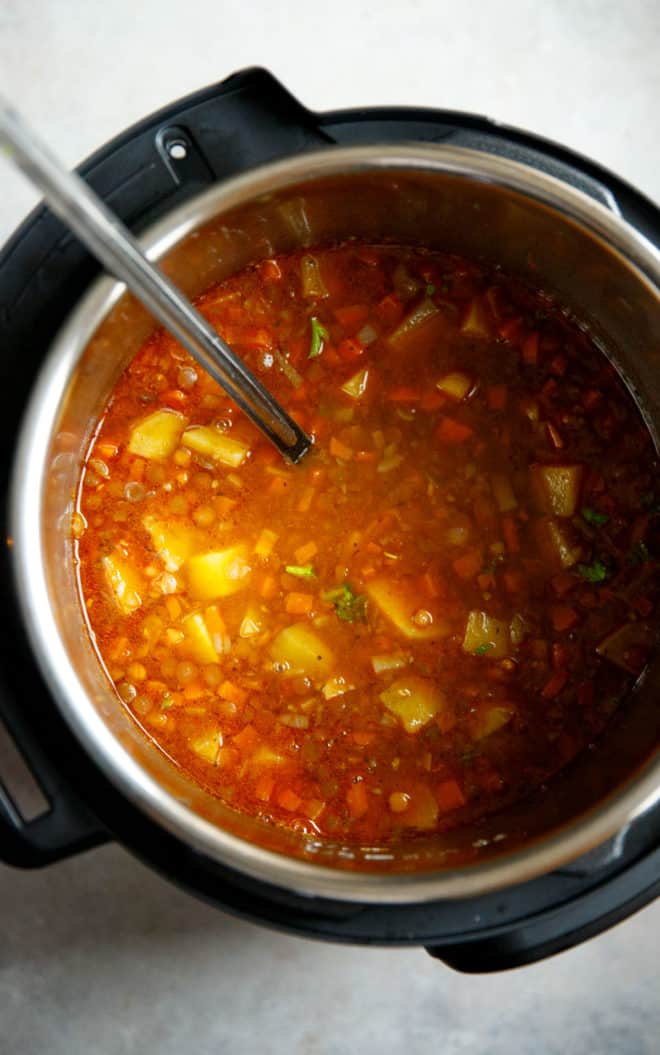Instant pot filled with lentil potato soup