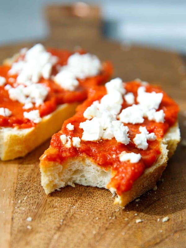 Lutenitsa on a slice of bread with feta on top