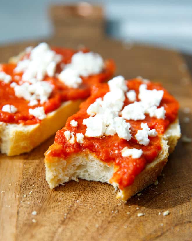Lutenitsa on a slice of bread with feta on top