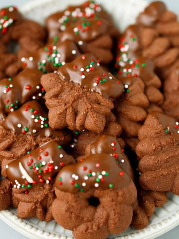 A plate with Christmas chocolate spritz cookies