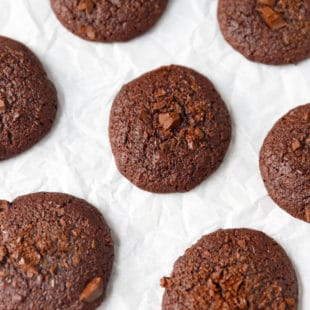vegan chocolate almond flour cookies on parchment paper