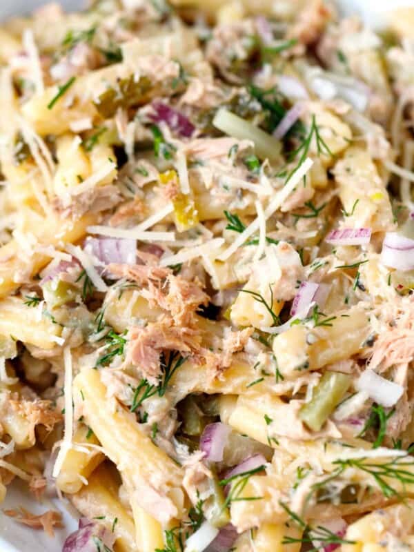 Tuna pasta with Parmesan in a white bowl