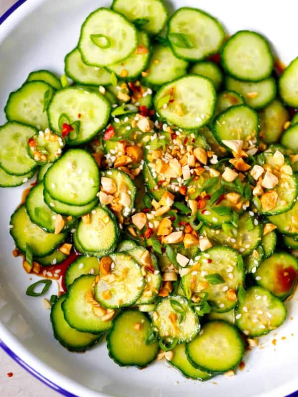 Asian cucumber salad in a white bowl