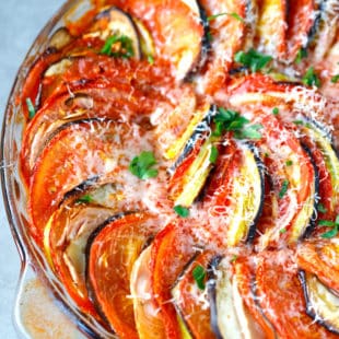 Baked layered ratatouille in a round dish