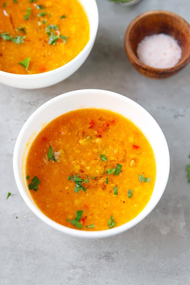 Small white ceramic bowl with red lentil soup from Instant Pot