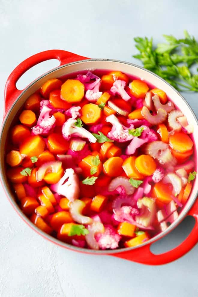 pickled vegetables in a red pot