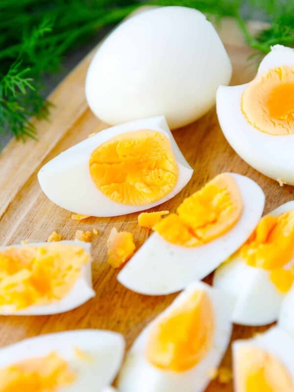 Hard boiled eggs made in the Air fryer cut on a cutting board