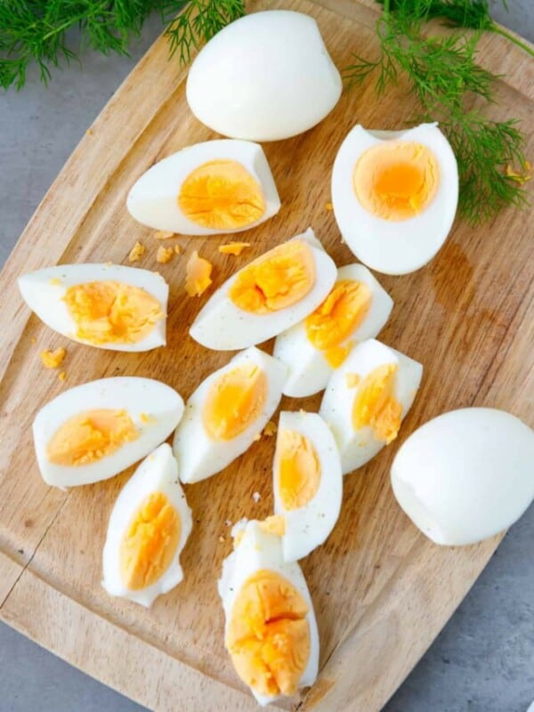 Hard boiled eggs in the air fryer on a cutting board