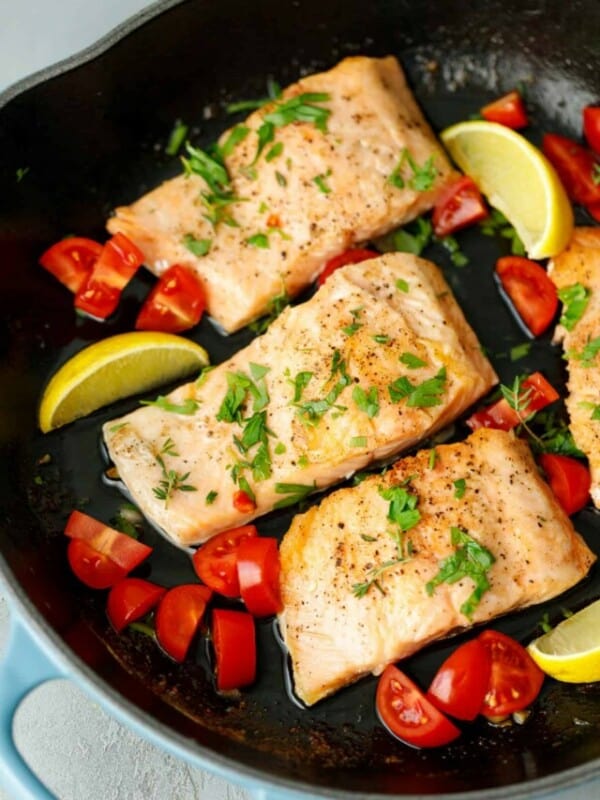 Salmon fillets in a cast iron skilletr