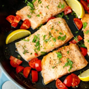 Salmon fillets in a cast iron skilletr