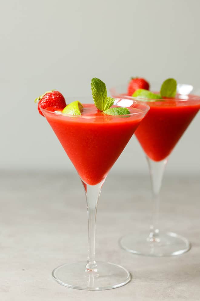 Two glasses with frozen strawberry daiquiri