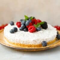 Chia cheesecake topped with berries on a plate