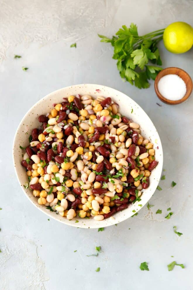 A bowl with colorful three bean salad.