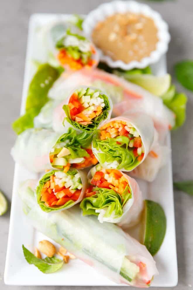 A white plate with vegetable spring rolls