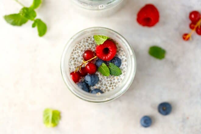 Chia pudding in a jar topped with berries