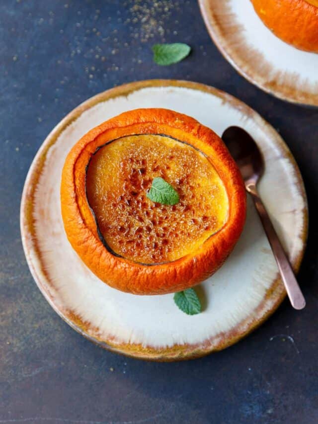 Keto pumpkin creme brulee inside a sugar pumpkin