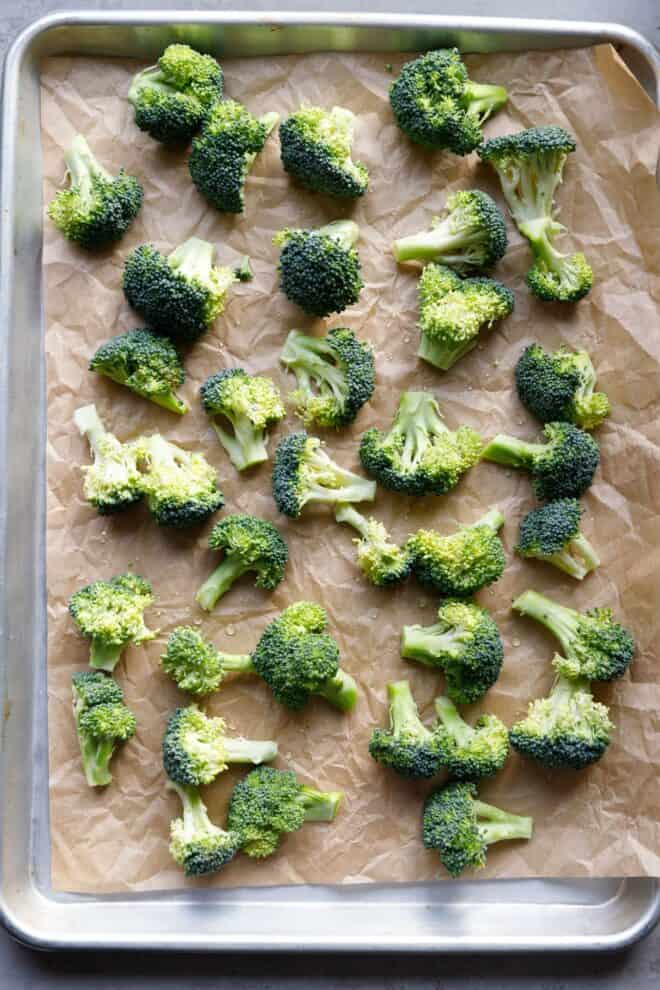 Broccoli florets on a baking sheet