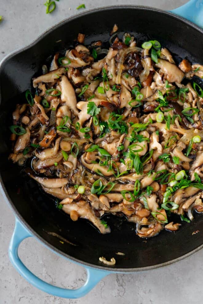 Shiitake mushrooms in a cast iron pan