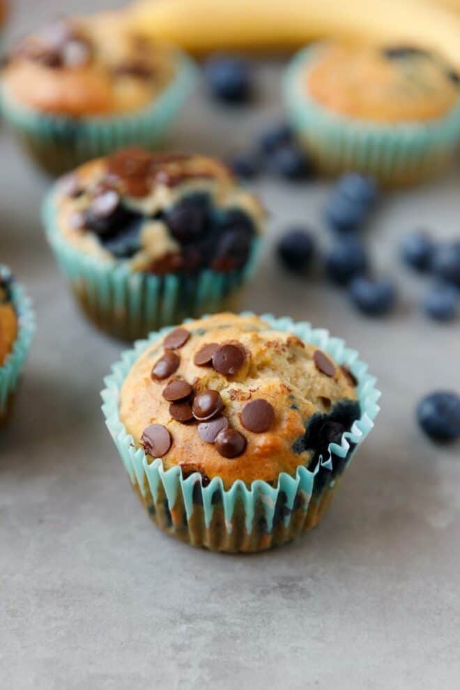 Blueberry banana muffin in a blue muffin liner