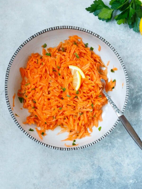 Ceramic bowl with grated carrot salad