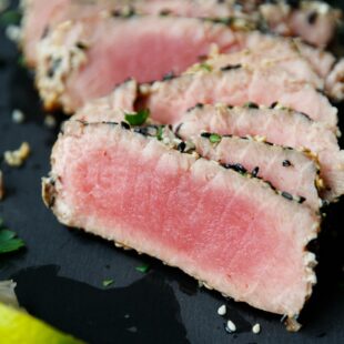 Ahi tuna steak on a cutting board