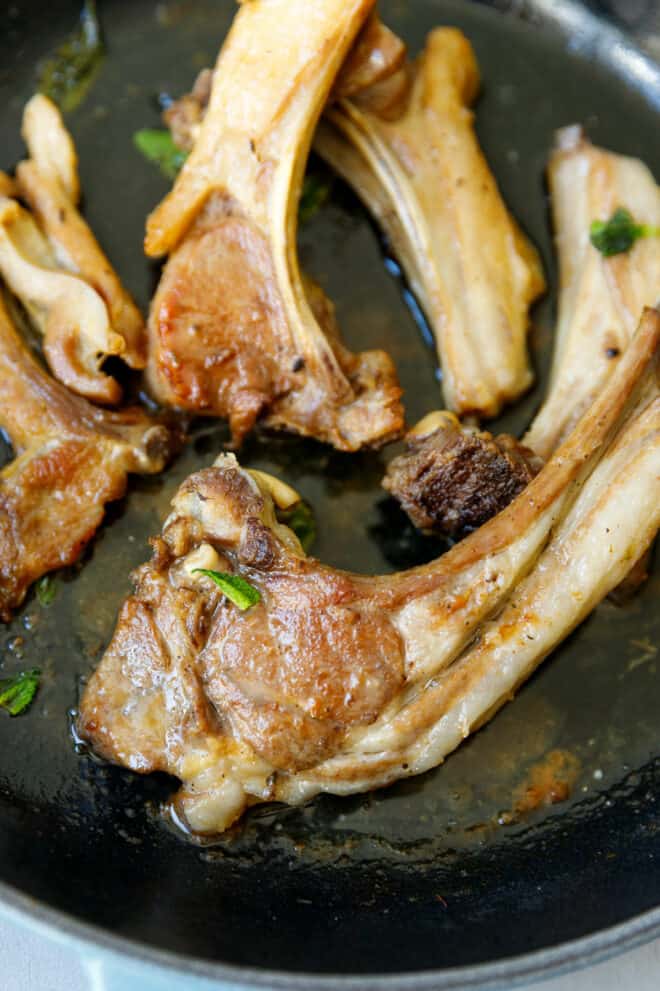 Lamb cutlets in a cast iron pan