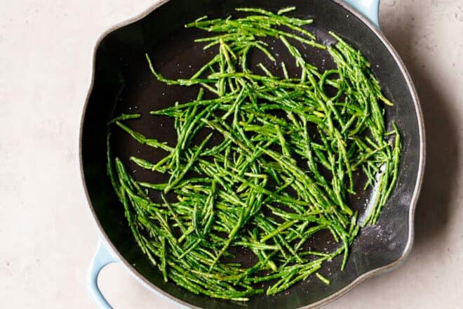 Sea asparagus in a cast iron pan