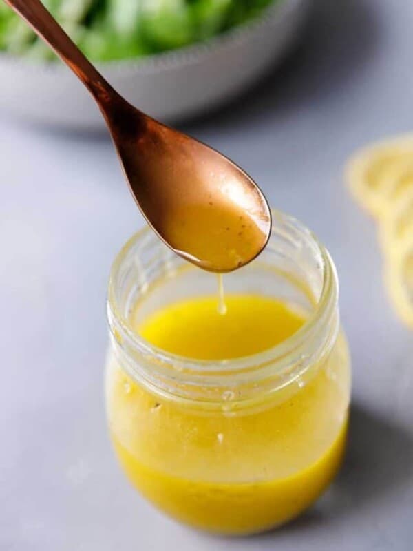 A jar with lemon vinaigrette