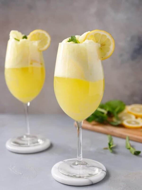 Two wine glasses with Limoncello Floats