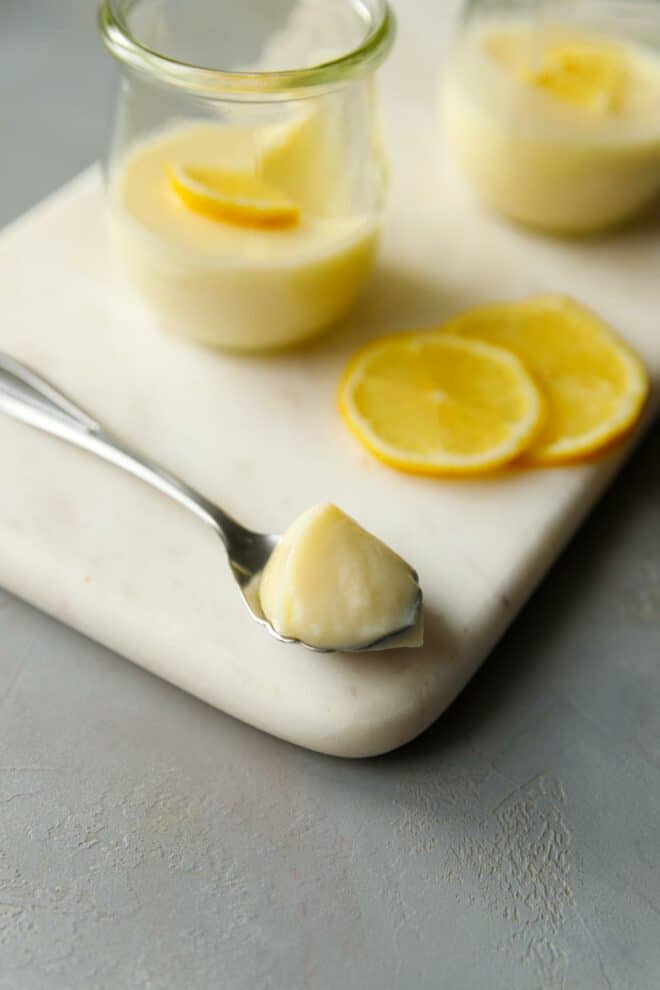 A spoon with lemon posset dessert