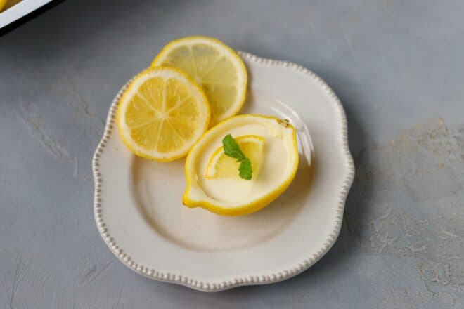 Lemon Posset in Lemon Shells on a plate