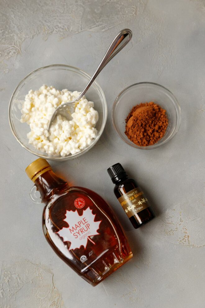 Ingredients for cottage cheese chocolate mousse on a gray surface