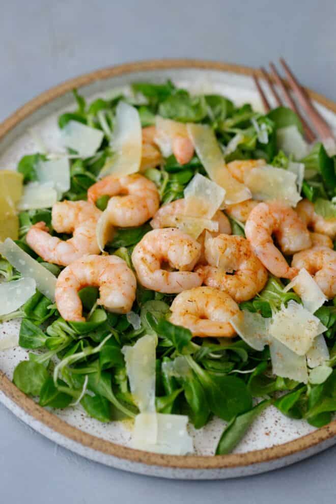 A plate with Lamb's Lettuce Salad with shrimp